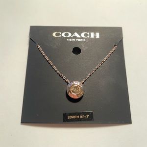 Rose gold coach necklace